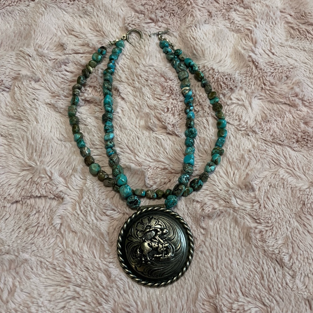 Turquoise Beaded Necklace with Silver Saddle Bronc Medallion